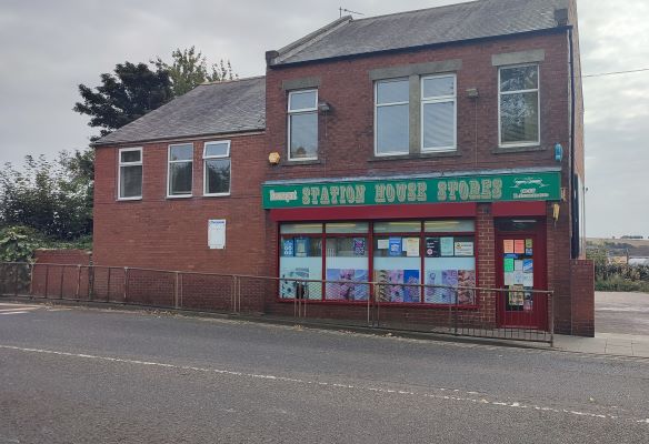 A corner shop by the name of "Station House Stores"