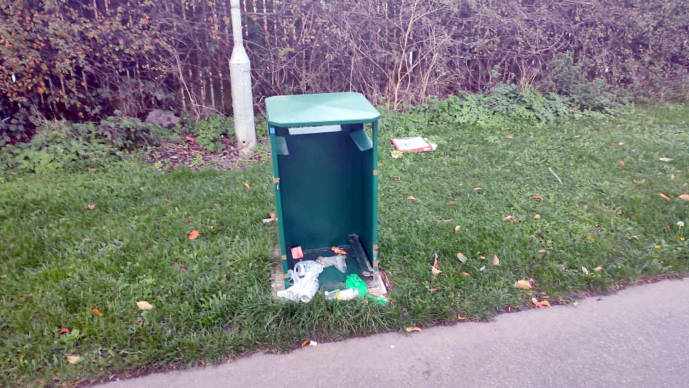 A bin with the front and binbag taken off