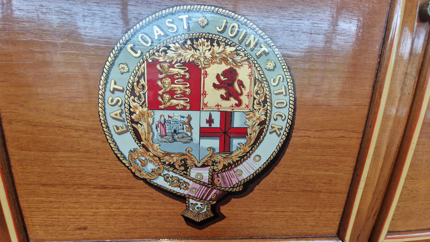 An elaborately painted coat of arms